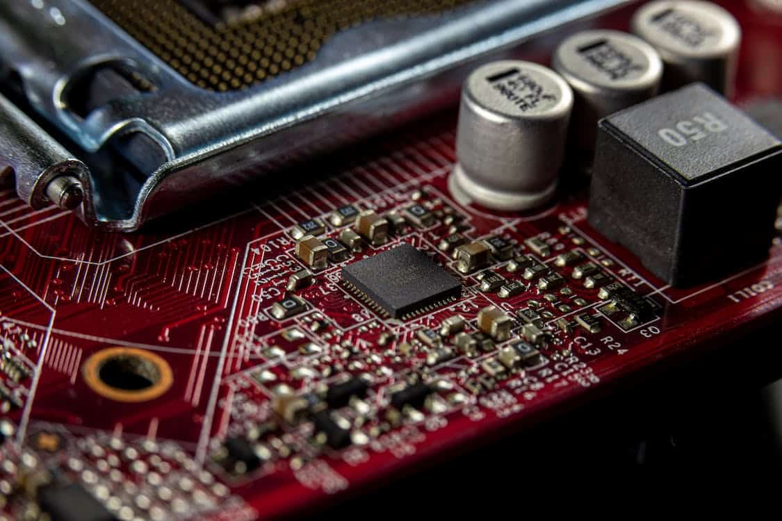 Detailed view of computer motherboard with tiny electronic component