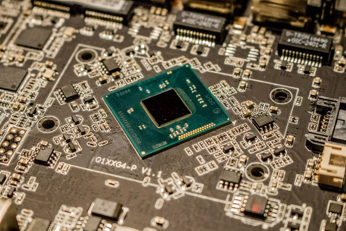 Close-up of microprocessor placed on top of a motherboard