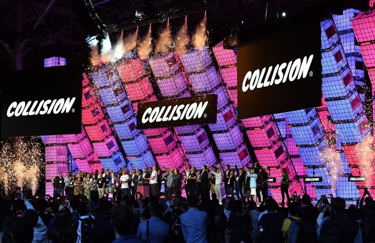 participants at collision event stand on the stage